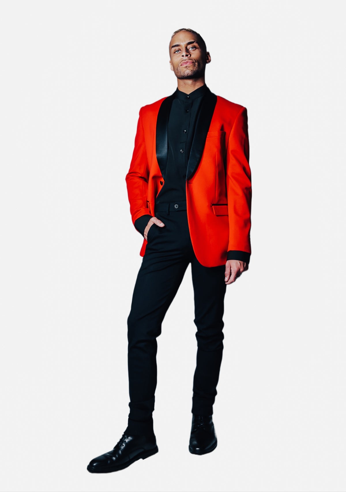 Men's Red Stretch Tuxedo Jacket on model, front view with black satin shawl lapel over a black shirt and black trousers