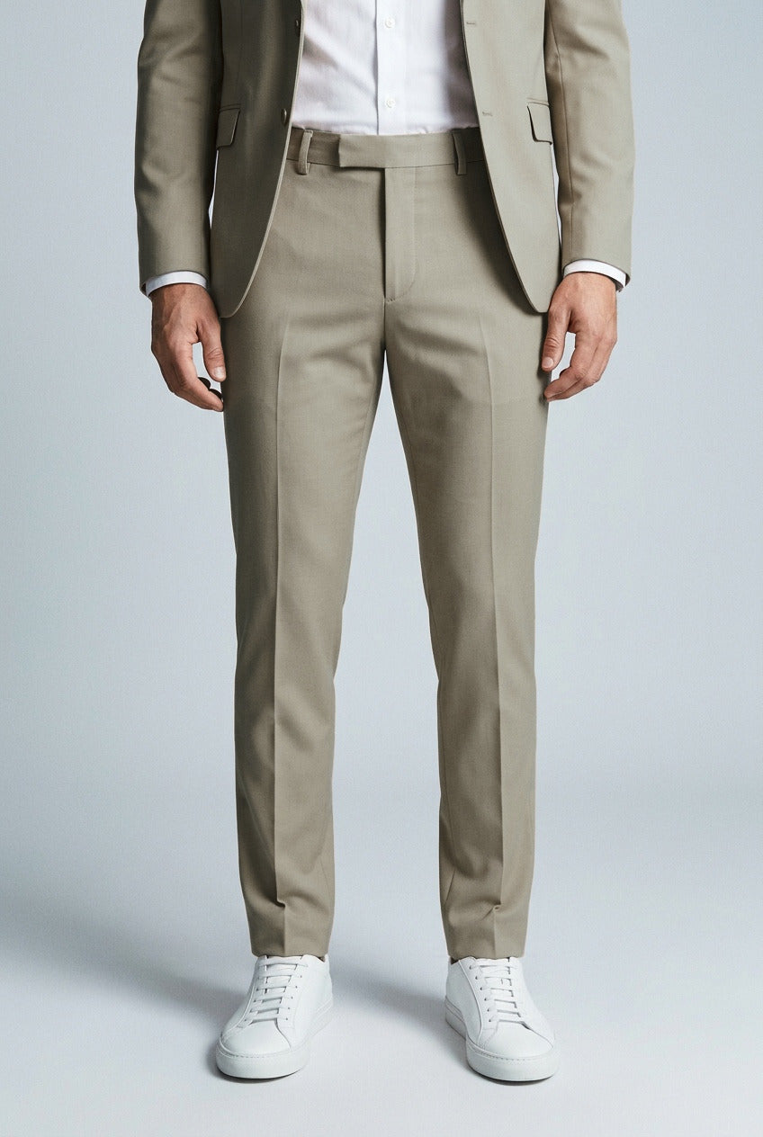 Men's Slim-Fit Beige Stretch Suit — matching trousers, slim-fit leg and hem detail with white sneakers