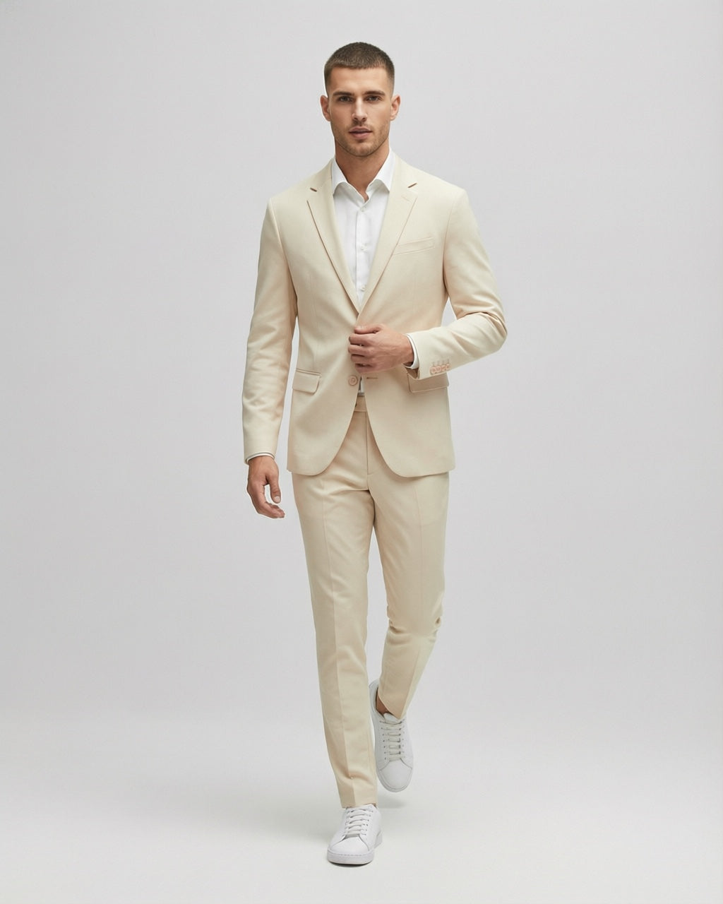 Men's Beige Tailored Stretch Suit — on model with white shirt and white sneakers