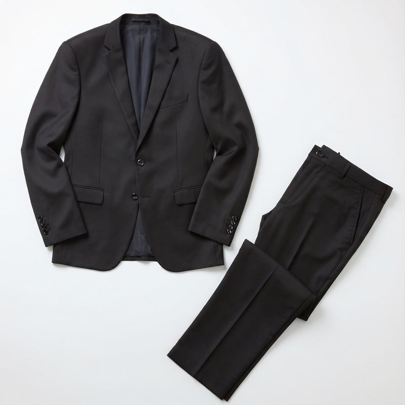 Men's Black Motion Stretch Suit laid flat with matching trousers