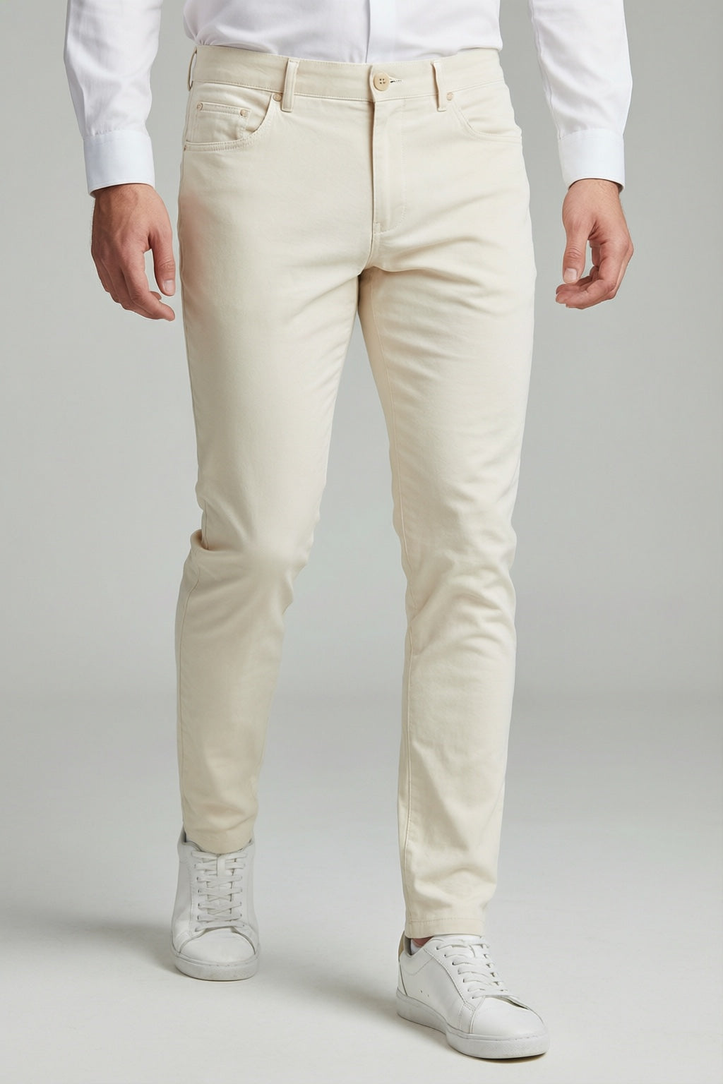 Men's Bone Motion Stretch Dress Pants — trouser fit and hem detail with white sneakers
