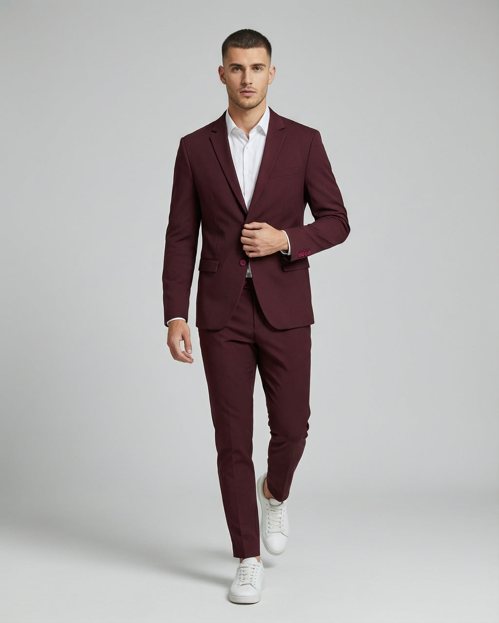 Men's Burgundy Tailored Stretch Suit — on model with white shirt and white sneakers
