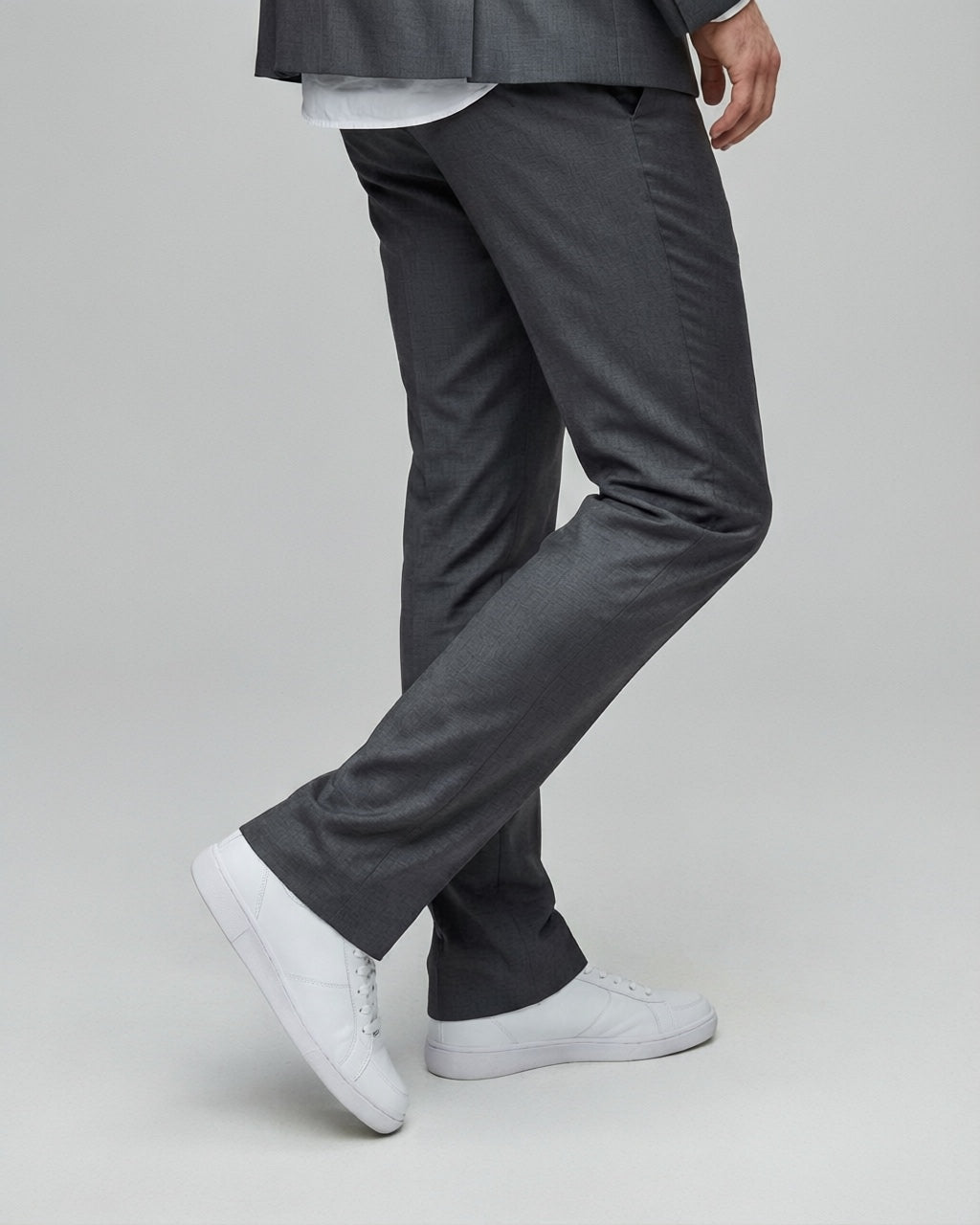 Men's Charcoal Tailored Stretch Suit — trouser fit and hem detail with white sneakers