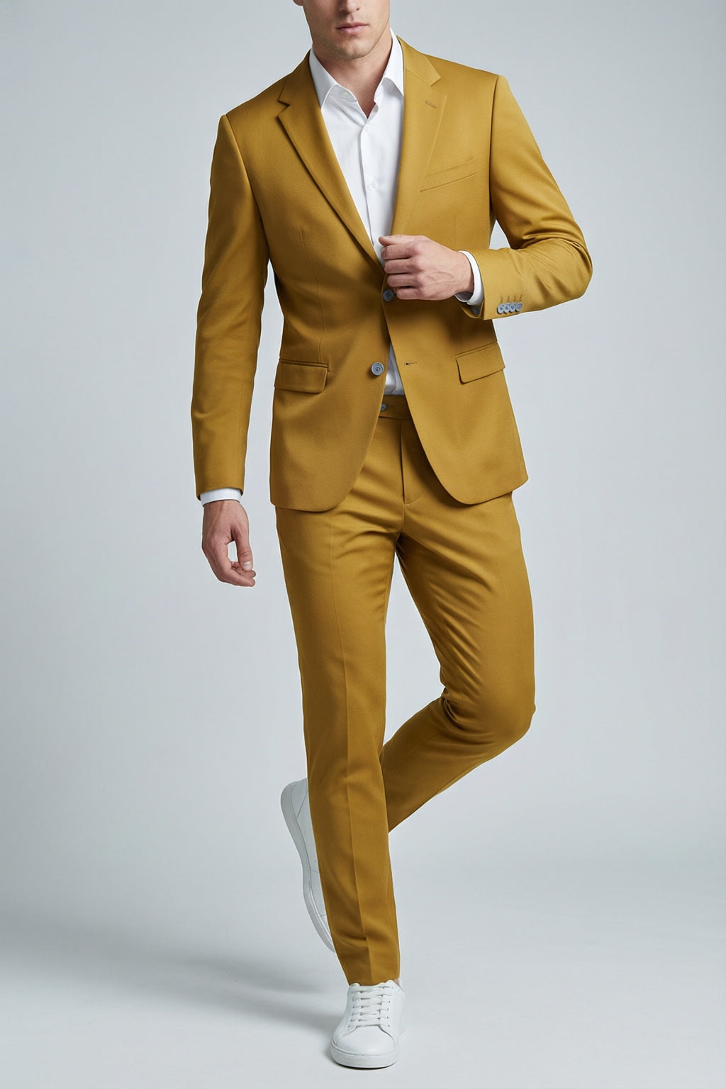 Men's Gold Motion Stretch Suit — on model with white shirt and white sneakers