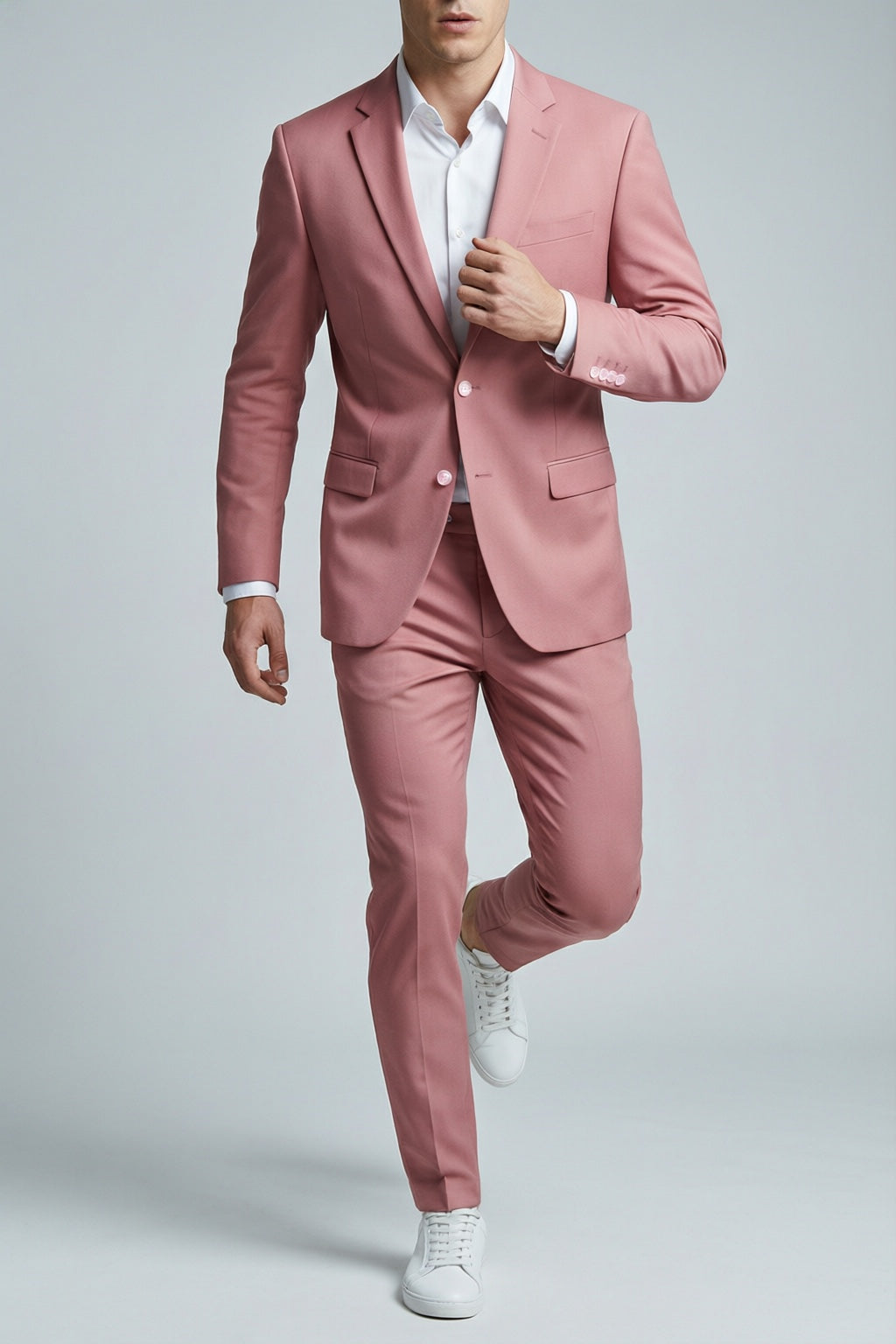 Men's Pink Motion Stretch Suit — on model with white shirt and white sneakers
