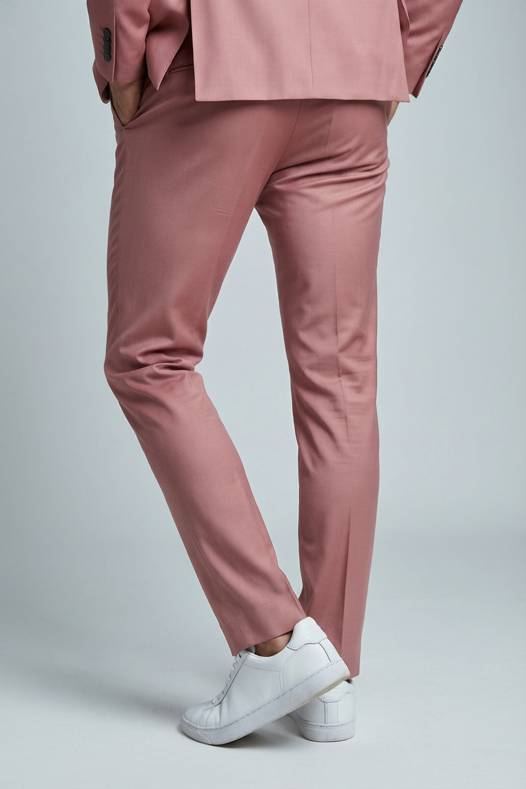 Men's Pink Motion Stretch Suit — trouser fit and hem detail with white sneakers