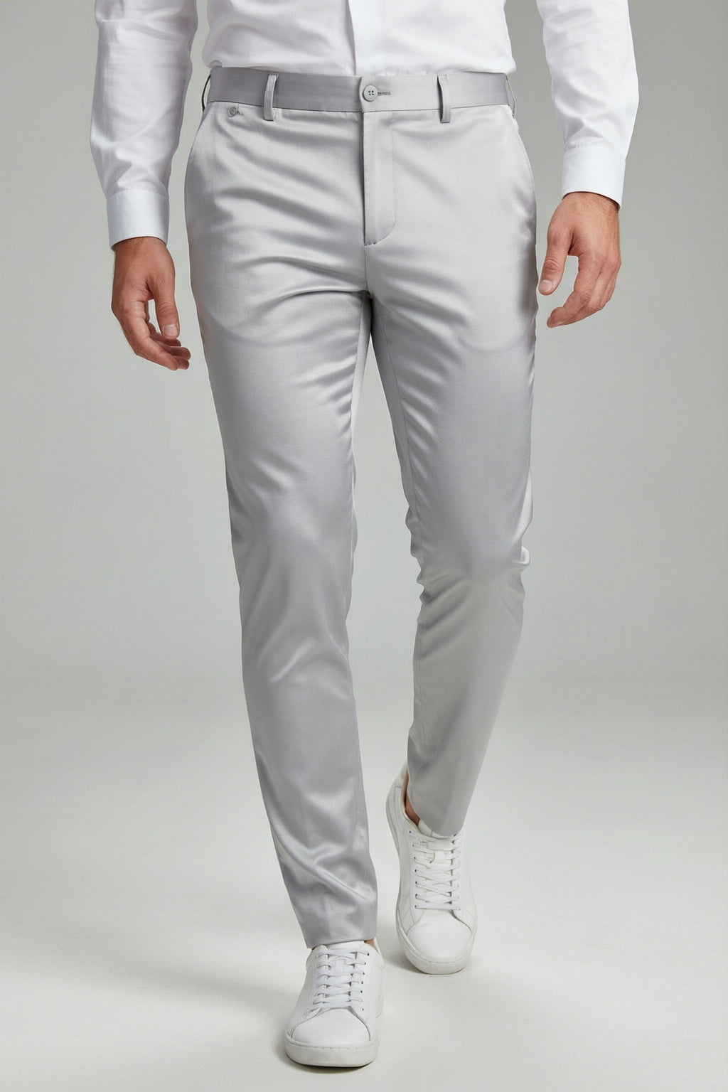 Men's Silver Motion Stretch Dress Pants — trouser fit and hem detail with white sneakers