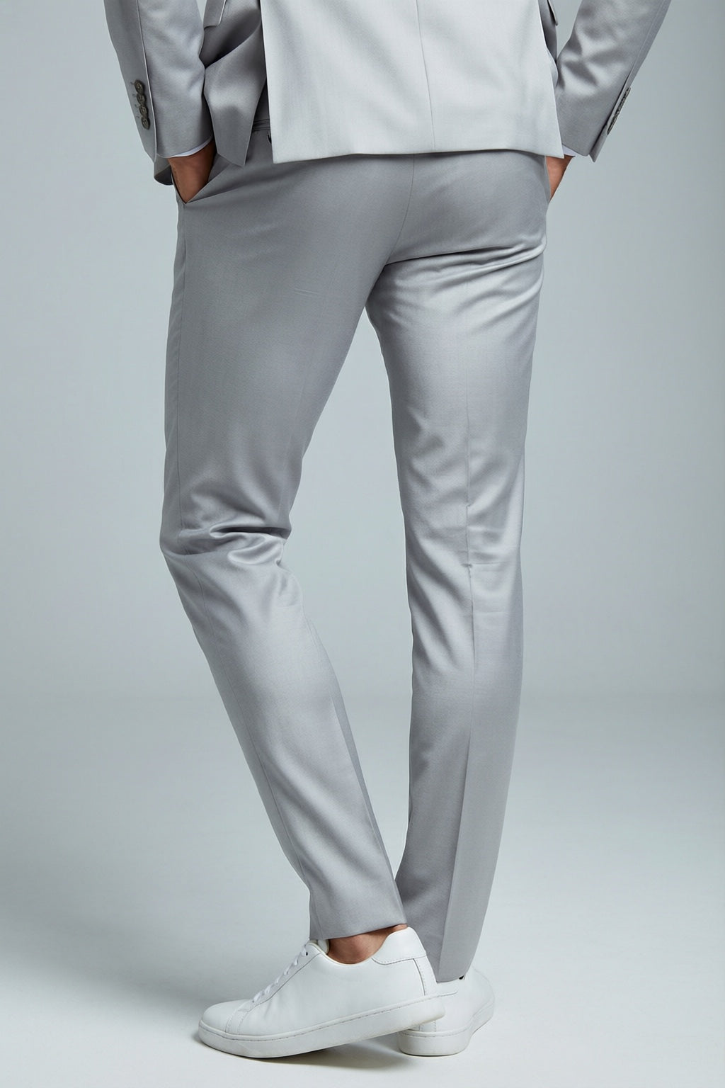 Men's Silver Motion Stretch Suit — trouser fit and hem detail with white sneakers