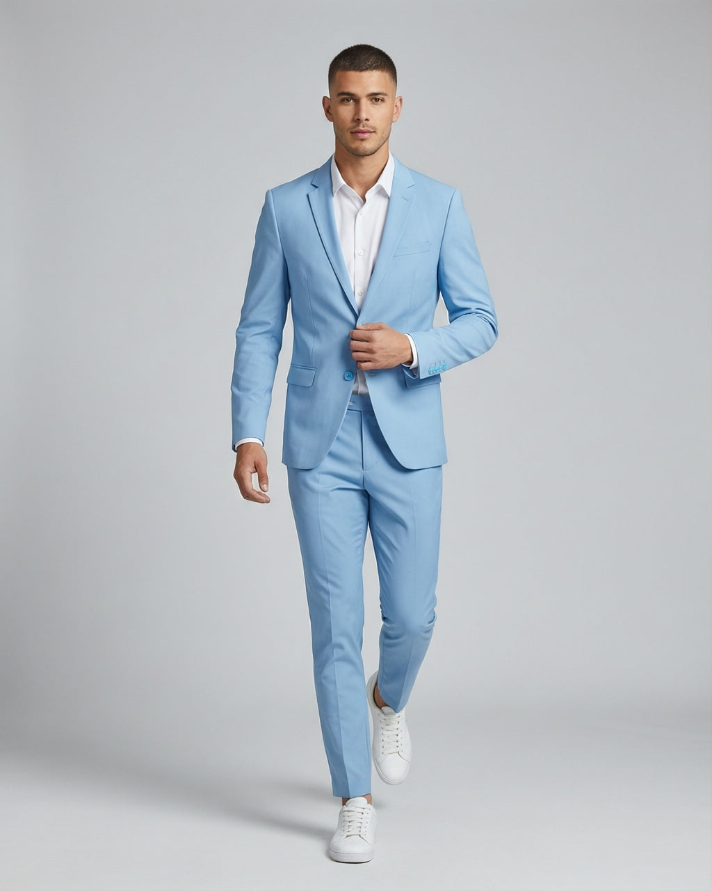 Men's Sky Blue Tailored Stretch Suit — on model with white shirt and white sneakers