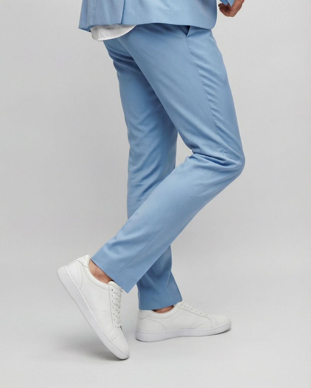 Men's Sky Blue Tailored Stretch Suit — trouser fit and hem detail with white sneakers